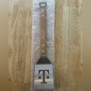 Stainless Steel and Wood Spatula with Cutout Design